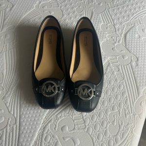 Lightly worn Michael Kors flats.